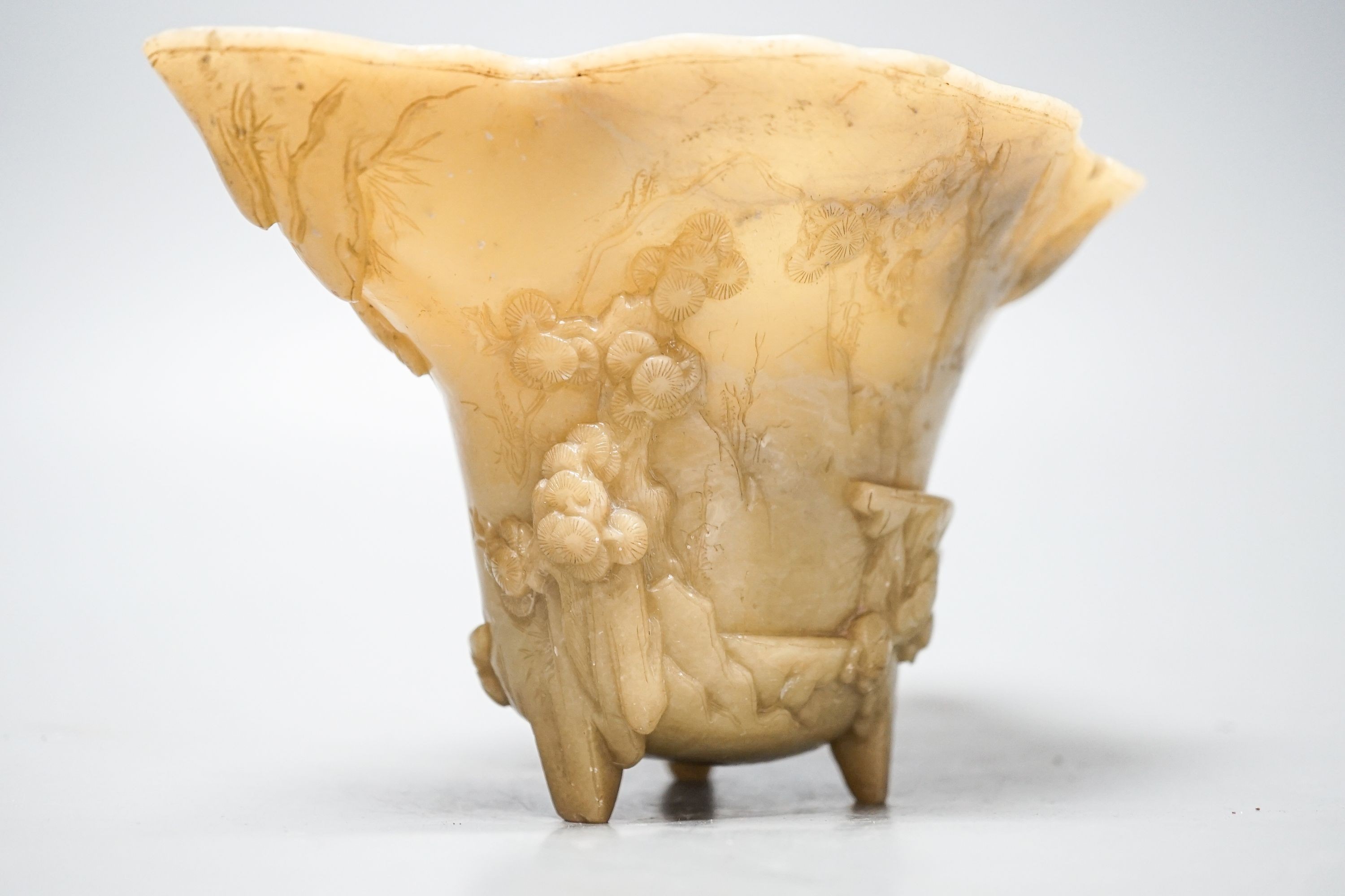 A Chinese carved soapstone libation cup, 19cm